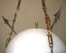 alabaster sphere with bronze arrows